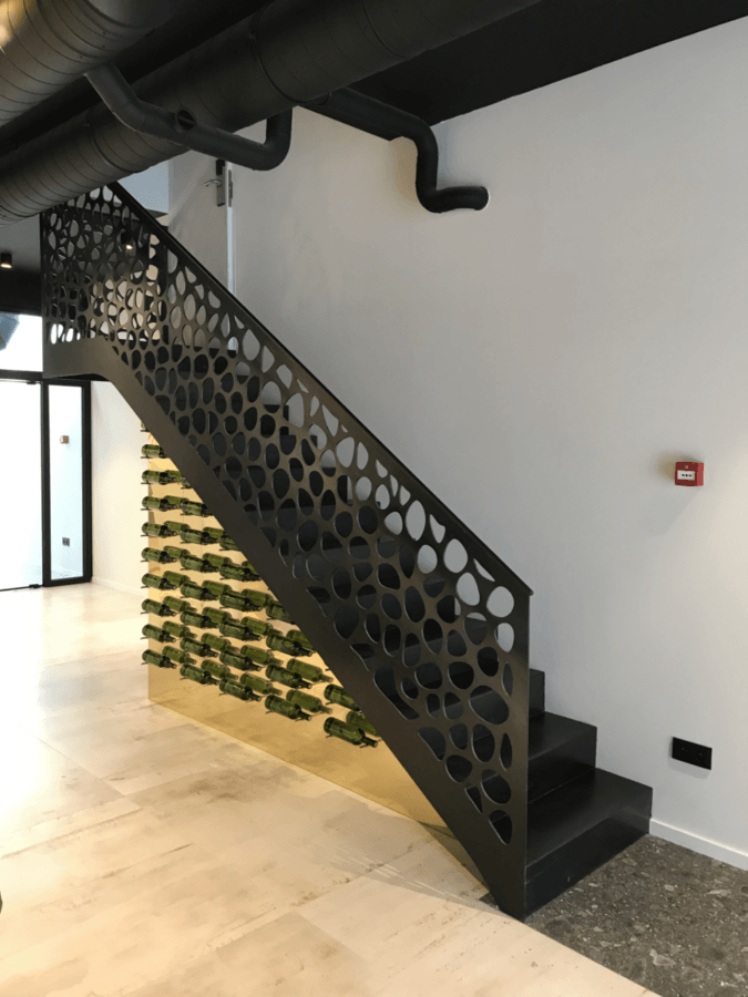 " Staircase and winerack", created by Kevin Oyen, designer and artisan metalworker
